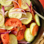 Cucumber, Tomato, and Onion Salad- A wonderful make-ahead salad recipe to use up those fresh garden vegetables!  It makes a great side dish to so many meals!