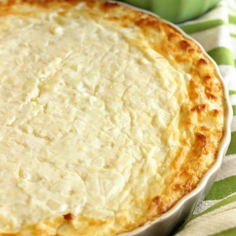 French Onion Dip - Everyone loves this appetizer! It's filled with cream cheese, onions, and parmesan cheese and baked to perfection!