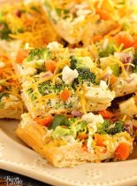 Veggie Squares -This easy appetizer is a great recipe for any get-together.  When you want a break from the ordinary vegetable tray, this is the way to go!  They are always a hit!  Crescent rolls, ranch packet, cream cheese, mayo, veggies, and shredded cheese...super easy!