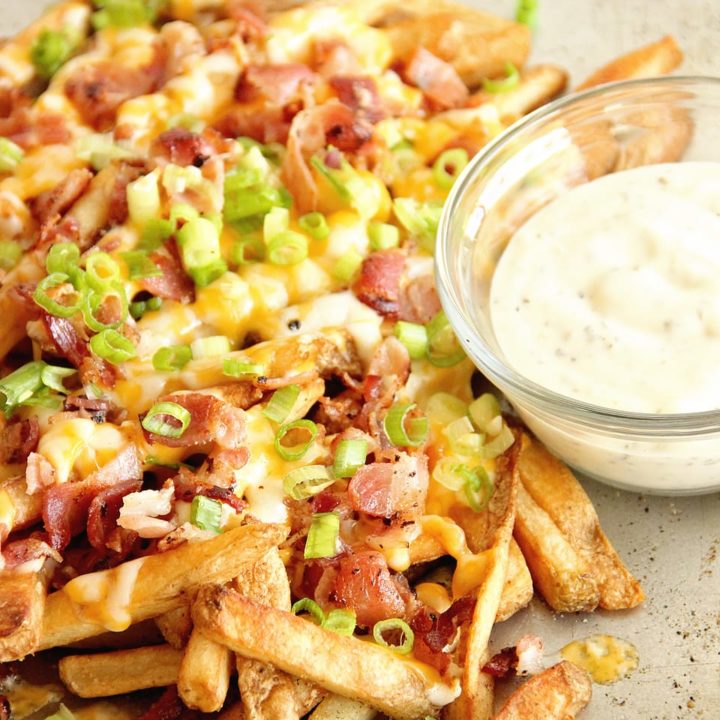 Copy Cat Aussie Cheese Fries - These loaded french fries make an excellent side dish, appetizer, or snack idea!
