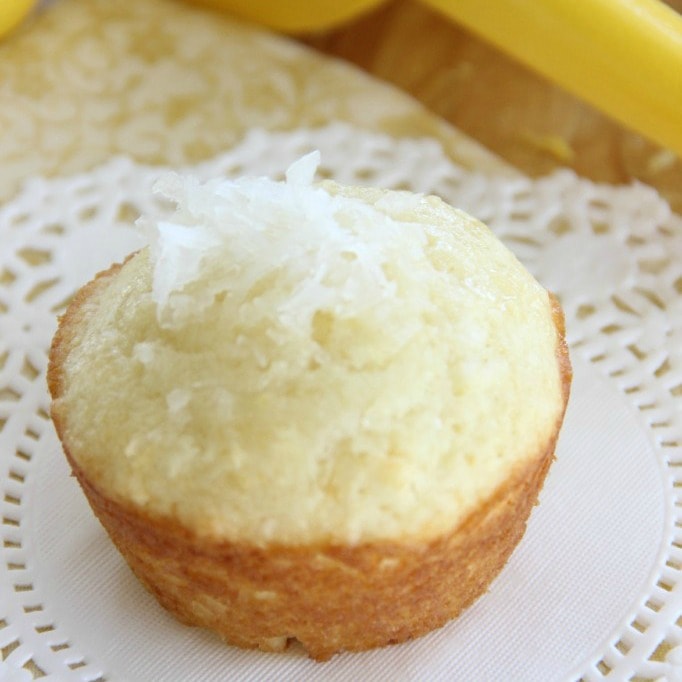 Lemon Burst Muffins - These little breakfast muffins are packed full of lemon flavor! They are a lemon lover's dream breakfast recipe!