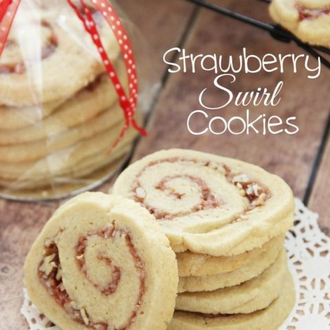 Strawberry Swirl Cookies - An easy sugar cookie swirled with strawberry jam and pecans. It makes a great Christmas cookie!