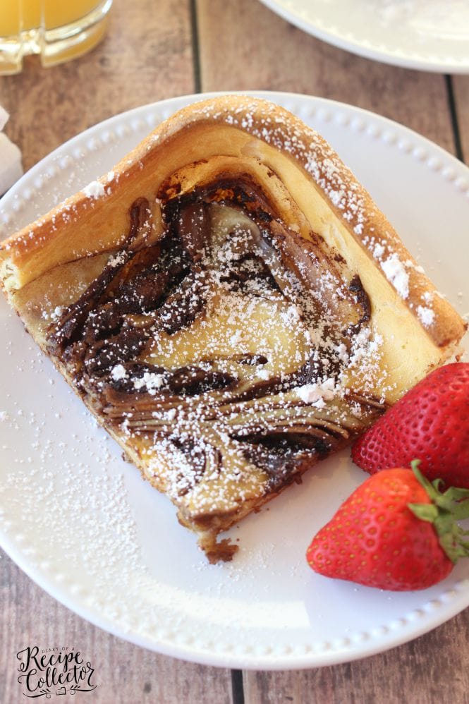 Nutella Swirl Puffy Pancake - An easy to prepare oven-baked pancake filled with swirls of Nutella.
