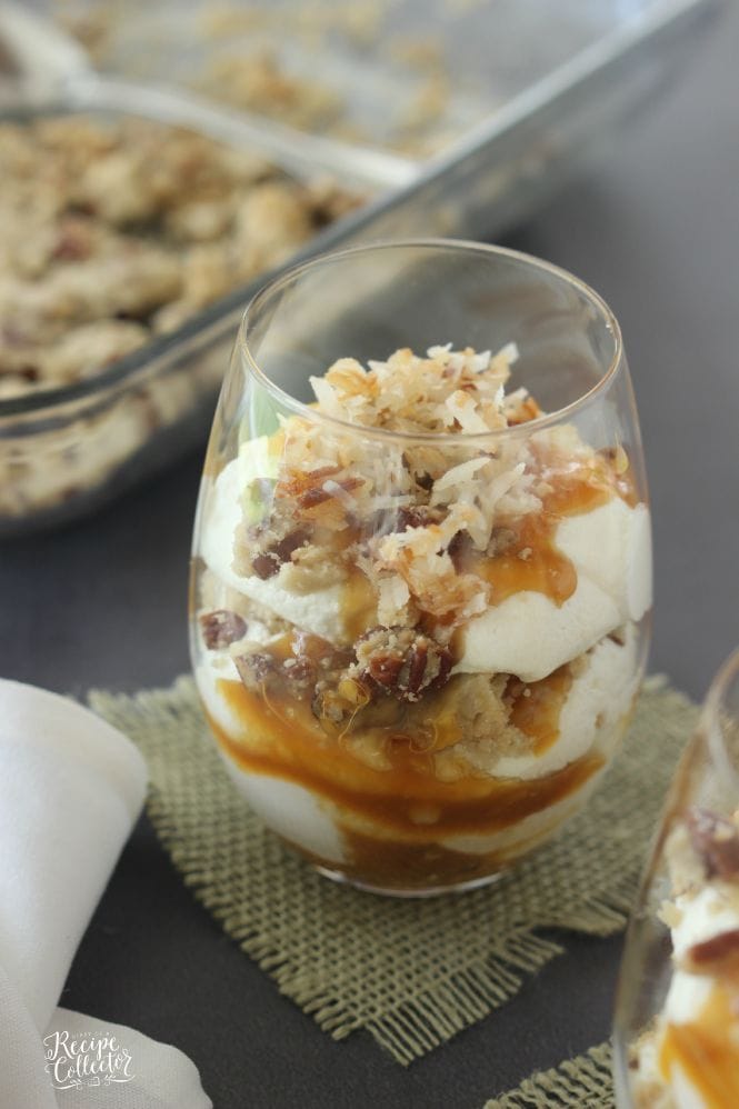 Coconut & Caramel Pecan Parfait - A decadent dessert filled with layers of pecan cookie crust, toasted coconut, cream cheese filling, and caramel. It would be perfect as a trifle dish too!