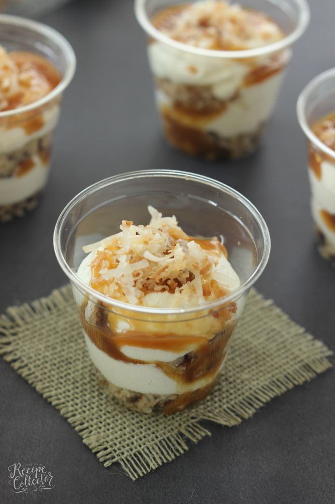 Coconut & Caramel Pecan Parfait - A decadent dessert filled with layers of pecan cookie crust, toasted coconut, cream cheese filling, and caramel. It would be perfect as a trifle dish too!