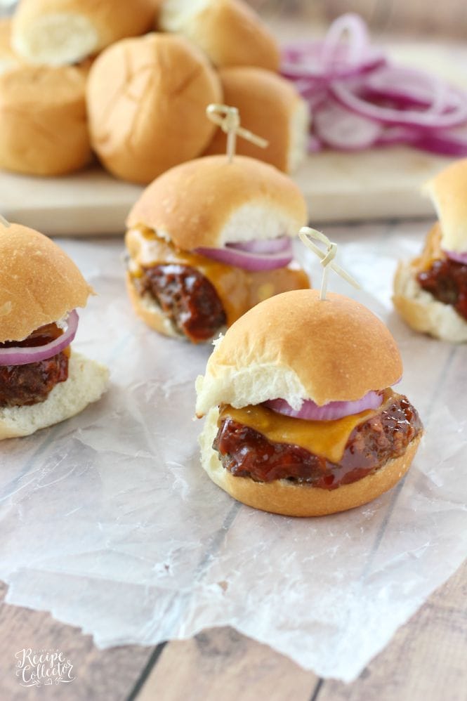 Barbecue Meatloaf & Cheddar Oven Sliders - Baked meatloaf slider burgers topped with a wonderful homemade easy barbecue sauce, cheddar cheese, and red onion. Perfect for game day! 