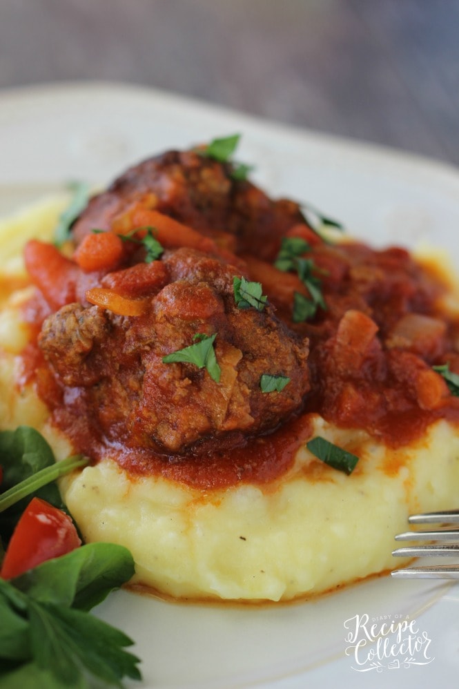 Zucchini Meatballs & Tomato Gravy - A perfect way to sneak those vegetables into meatballs! Plus they are served with a delicious tomato gravy and carrots. They are perfect served over mashed potatoes.