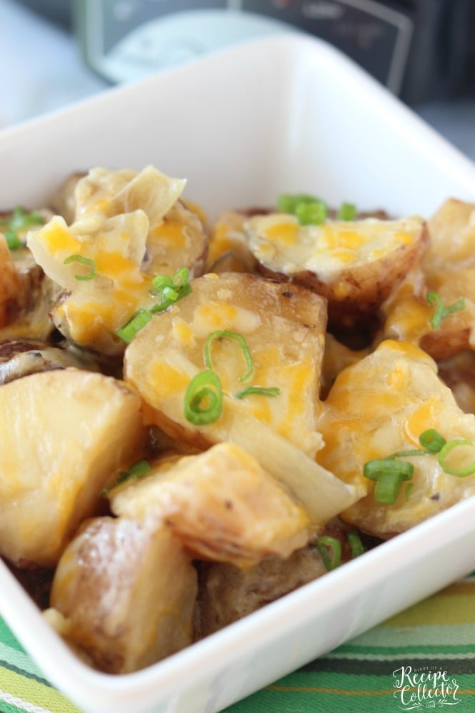 Slow Cooker Potatoes - A great potato side dish that is easy to put together. It goes perfect with chicken, beef, or pork too!