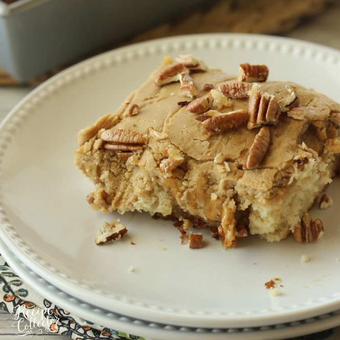 Praline Poke Cake - This butter pecan cake has the most delicious praline icing plus it's filled with caramel!