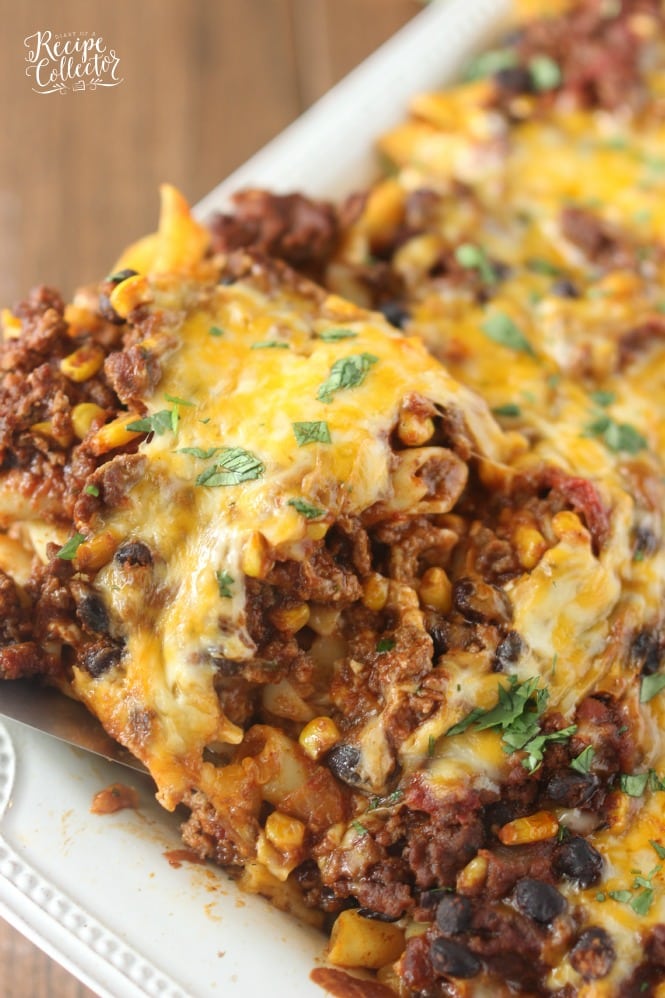 Mexican Baked Ziti - A comforting casserole filled with pasta, ground beef, cheese, Ragu sauce, black beans, and corn.
