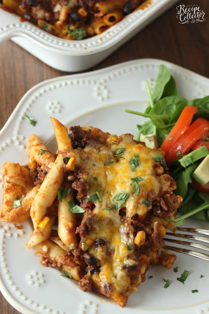 Mexican Baked Ziti – A comforting casserole filled with pasta, ground beef, cheese, Ragu sauce, black beans, and corn.