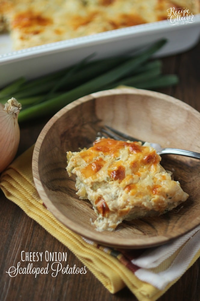 Cheesy Onion Scalloped Potatoes - Layers of thinly sliced potatoes in a rich and creamy sauce filled with caramelized onion flavor.