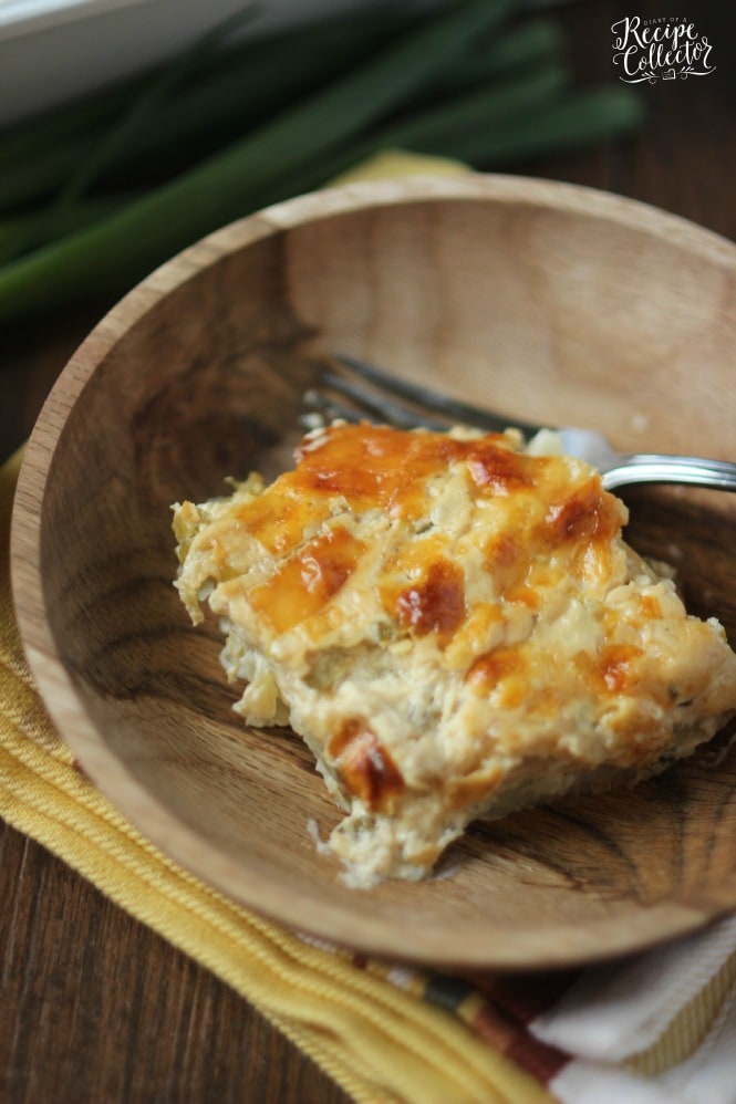 Cheesy Onion Scalloped Potatoes - Layers of thinly sliced potatoes in a rich and creamy sauce filled with caramelized onion flavor.