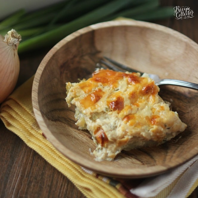 Cheesy Onion Scalloped Potatoes - Layers of thinly sliced potatoes in a rich and creamy sauce filled with caramelized onion flavor.