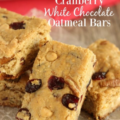 Cranberry White Chocolate Oatmeal Bars - A super easy cookie bar filled with dried cranberries, white chocolate chips, pecans, and oatmeal.