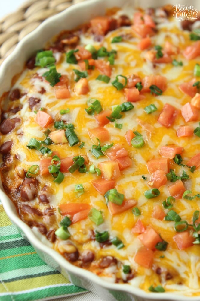 Hot Bean & Cheese Dip - A quick oven-baked dip made with cream cheese, chili beans, salsa, and melty cheese!