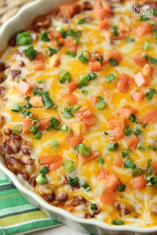 Hot Bean & Cheese Dip - A quick oven-baked dip made with cream cheese, chili beans, salsa, and melty cheese!