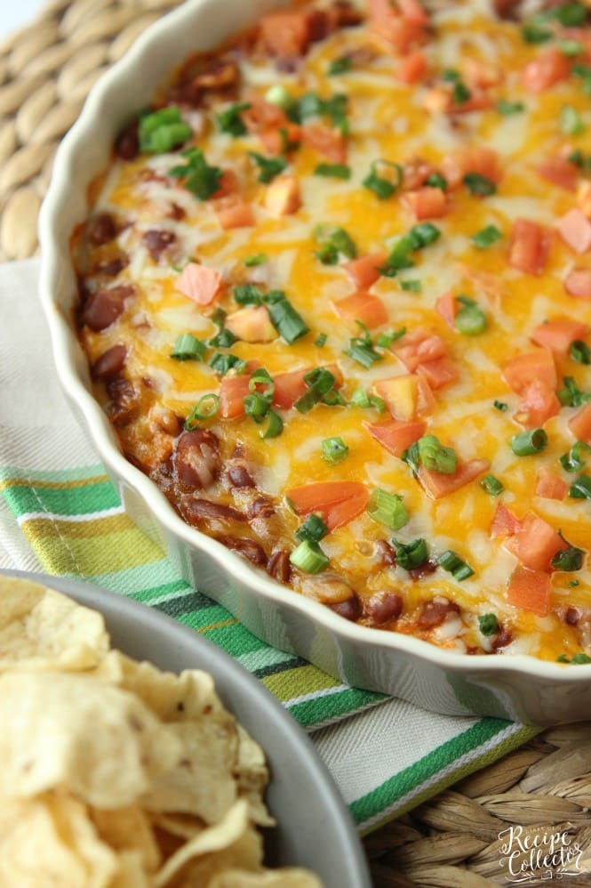 Hot Bean & Cheese Dip - A quick oven-baked dip made with cream cheese, chili beans, salsa, and melty cheese!