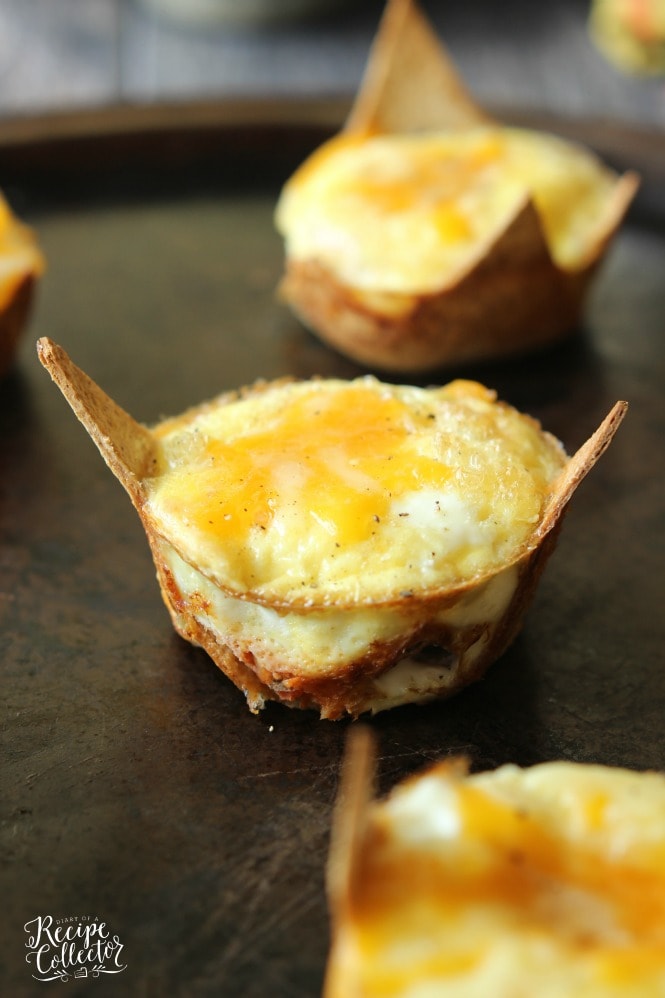 Taco Egg Muffin Cups - A great grab and go breakfast idea that is high in protein and low in carbs.  Plus, it's only 3 freestyle points!