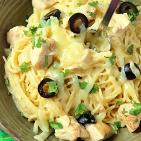 White Chicken Enchilada Pasta - A delicious pasta filled with all the wonderful flavor of white chicken enchiladas with the help of green chilies, a little sour cream, and melted jack cheese.