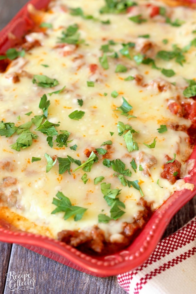 Italian Ravioli Pasta Bake - Layers of meat sauce, cheese ravioli, spinach, and cheese baked up to perfection.