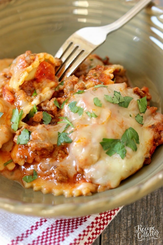 Italian Ravioli Pasta Bake - Layers of meat sauce, cheese ravioli, spinach, and cheese baked up to perfection.