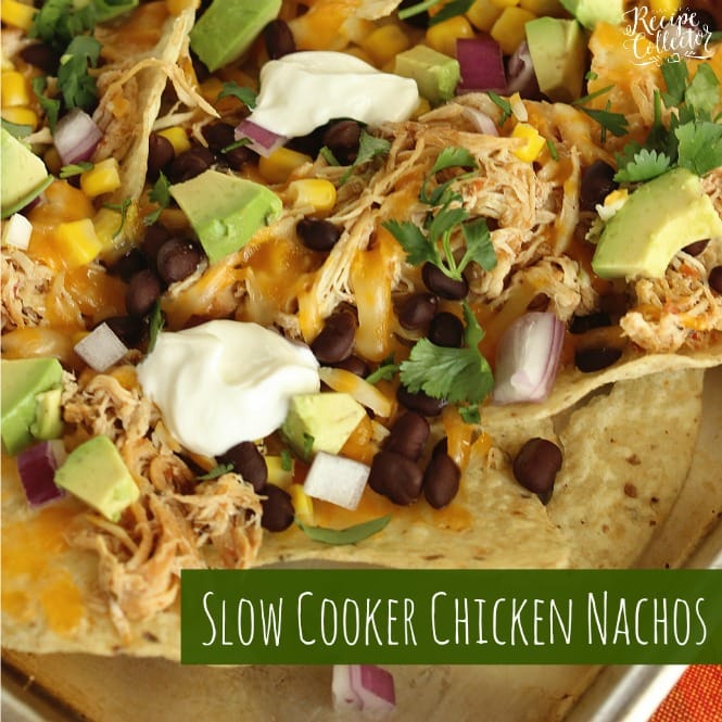 Slow Cooker Chicken Nachos - Chicken breasts cooked with a homemade salsa in the slow cooker, black beans, corn, red onion, and diced avocados piled on corn tortilla chips and broiled to create an easy Mexican dinner!