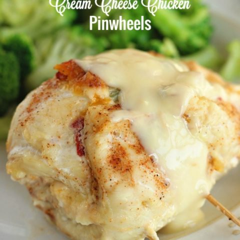 Stuffed Cream Cheese Chicken - Chicken breasts filled and rolled up with a delicious cream cheese spread and baked in the oven. They are such a nice change from the usual chicken dinner!