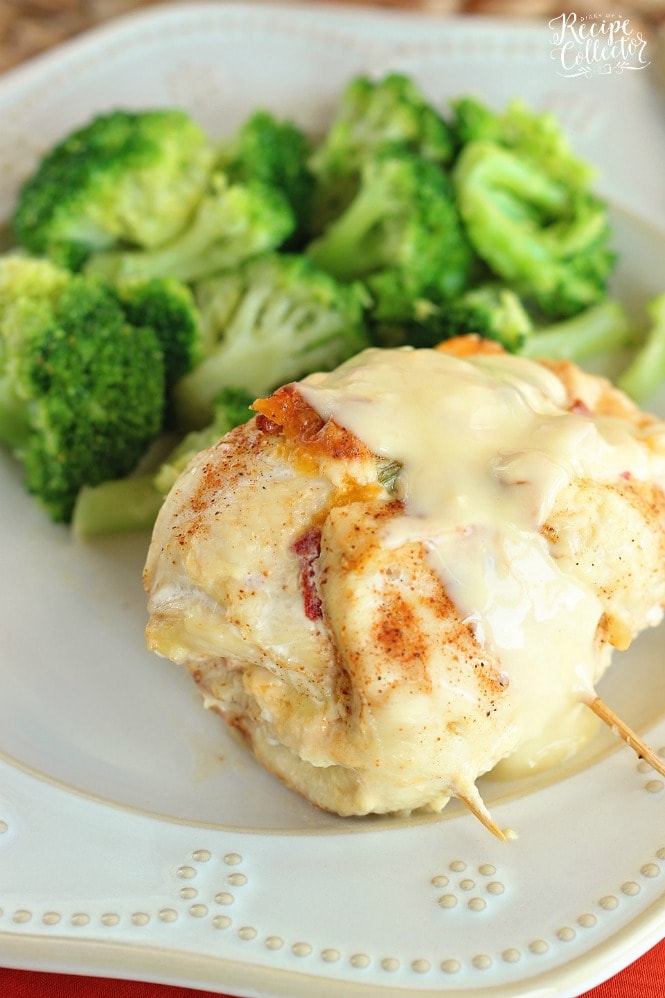 Stuffed Cream Cheese Chicken - Chicken breasts filled and rolled up with a delicious cream cheese spread and baked in the oven. They are such a nice change from the usual chicken dinner!