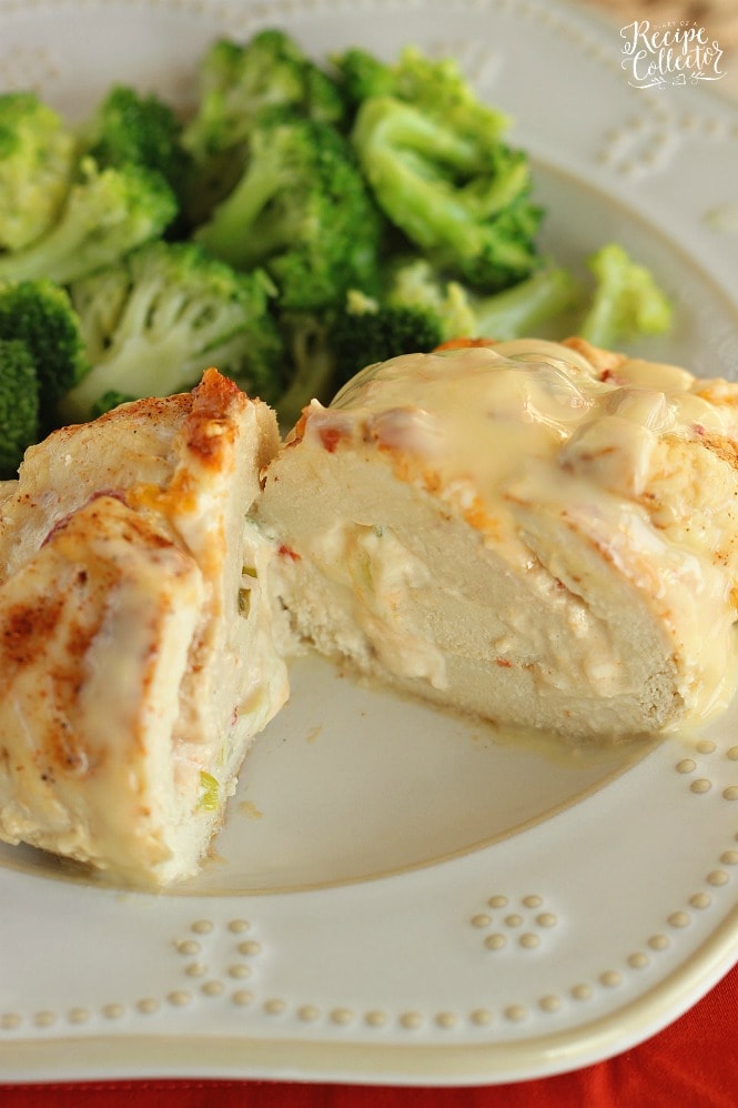 Stuffed Cream Cheese Chicken - Chicken breasts filled and rolled up with a delicious cream cheese spread and baked in the oven. They are such a nice change from the usual chicken dinner!