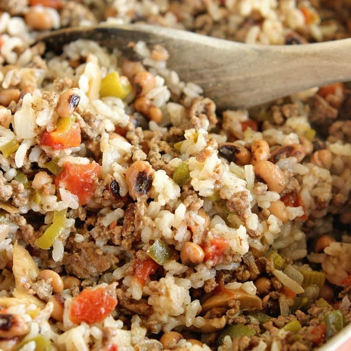 One-Pot Cajun Black-Eyed Peas & Rice - A delicious easy one pot super packed full of Cajun flavor and filled with ground beef, black-eyed peas, diced tomatoes, and rice.