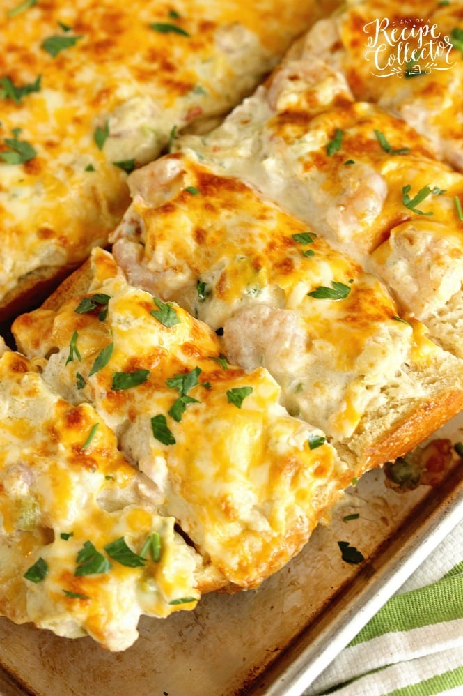 Shrimp & Artichoke French Bread - A perfect appetizer made with a cheesy, creamy topping filled with shrimp and artichokes!