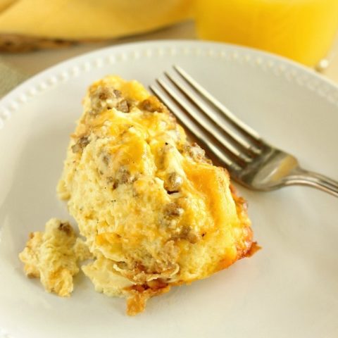 This Sour Cream Breakfast Casserole is one of the BEST yet! It is filled with layers of challah bread, breakfast sausage, eggs, sour cream, and cheese, and it is a perfect make-ahead idea!