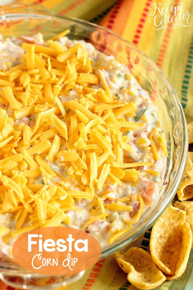 Fiesta Corn Dip - This corn dip version has that spicy-sweet kick with the help of pepper jelly, whipped cream cheese, and pico de gallo! It's a great make ahead dip recipe idea too!