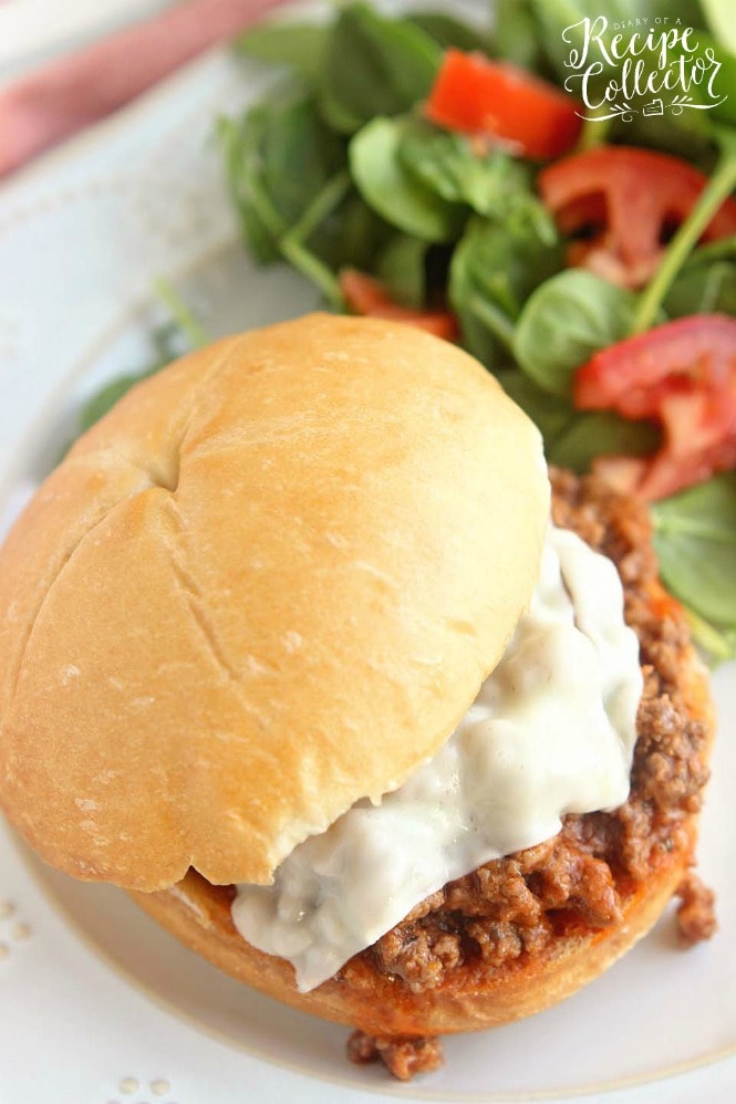 Pizza Sloppy Joes - A delicious homemade sloppy joe with all the flavor of pizza! It's a quick and easy 30 minute dinner recipe perfect for busy families!