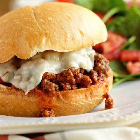 Pizza Sloppy Joes - A delicious homemade sloppy joe with all the flavor of pizza! It's a quick and easy 30 minute dinner recipe perfect for busy families!