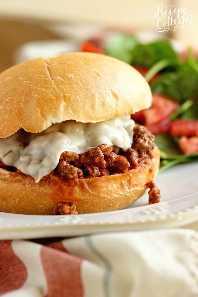 Pizza Sloppy Joes - A delicious homemade sloppy joe with all the flavor of pizza! It's a quick and easy 30 minute dinner recipe perfect for busy families!