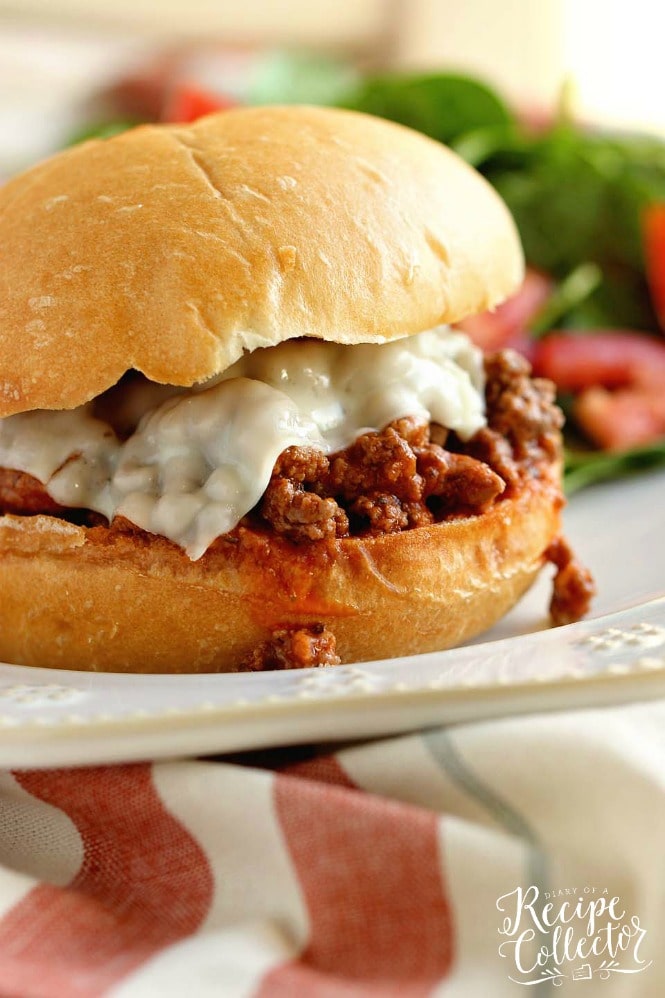 Pizza Sloppy Joes - A delicious homemade sloppy joe with all the flavor of pizza! It's a quick and easy 30 minute dinner recipe perfect for busy families!