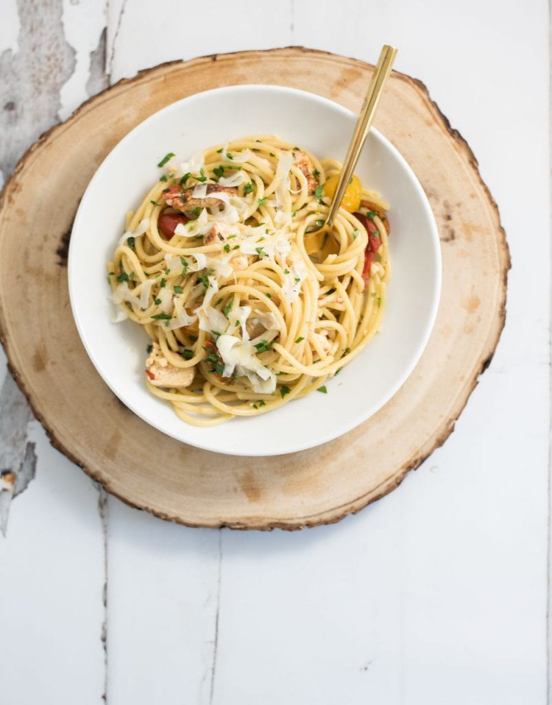 Garlic Bucatini with Blistered Tomatoes and Spicy Chicken