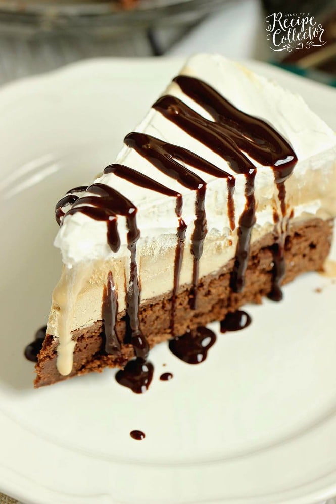 Mocha Brownie Ice Cream Cake - Layers of delicious brownie, coffee cream cheese , coffee ice cream, and whipped topping.  If you love an iced mocha frappe, then you will love this dessert!