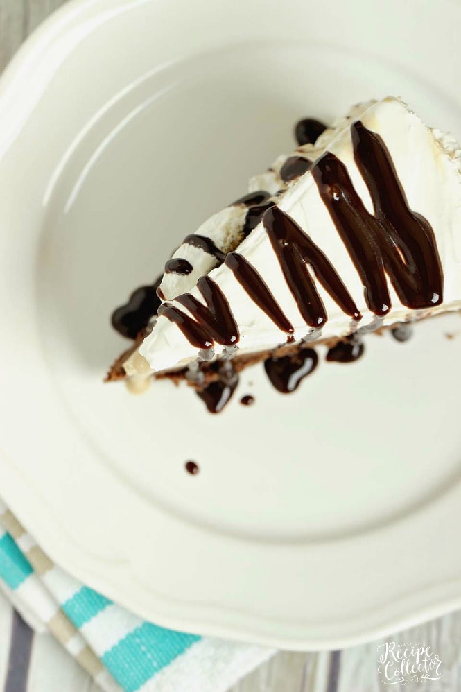 Mocha Brownie Ice Cream Cake - Layers of delicious brownie, coffee cream cheese , coffee ice cream, and whipped topping.  If you love an iced mocha frappe, then you will love this dessert!