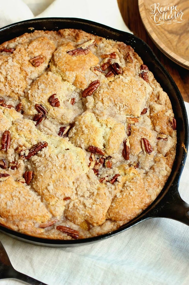 Easy Peach Pecan Skillet Cake - A simple and comforting peach dessert with some surprising ingredients in the batter that make this cake divine!