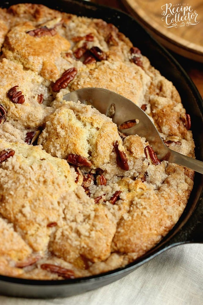 Easy Peach Pecan Skillet Cake - A simple and comforting peach dessert with some surprising ingredients in the batter that make this cake divine!