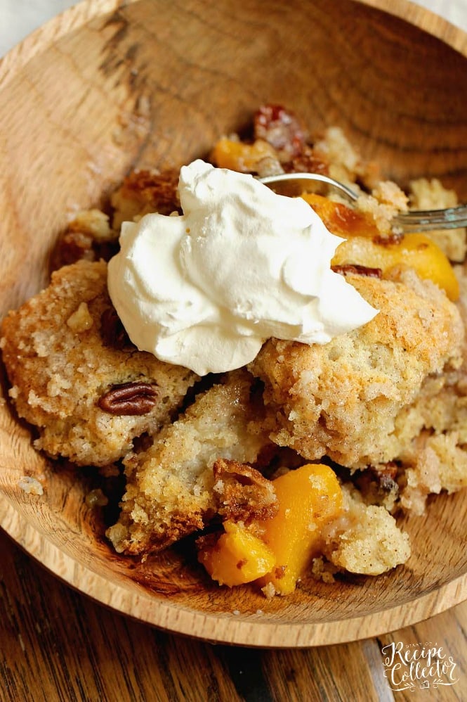 Easy Peach Pecan Skillet Cake - A simple and comforting peach dessert with some surprising ingredients in the batter that make this cake divine!