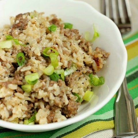 Best Rice Dressing - The perfect side dish to barbecues and baked ham, turkey, and chicken is rice dressing!  This recipe is delicious, easy, and feeds a crowd.