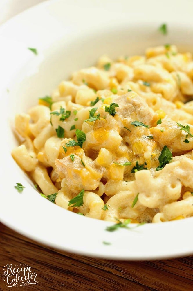 Green Chile Chicken Mac and Cheese - This hearty all-in-one macaroni and cheese dinner idea is filled with chicken, green chiles, corn, and of course all the creamy cheese!