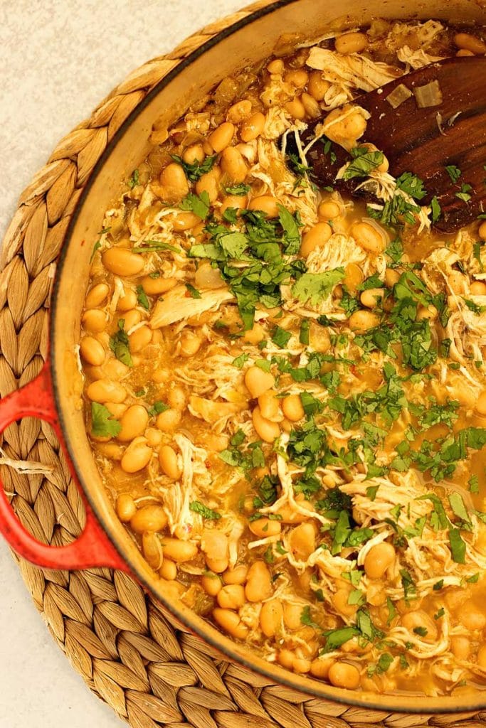 Easy White Bean Chicken Soup is a healthy one pot soup with chicken, Great Northern beans, and green chiles. High-protein, high-fiber, and perfect for meal prep.