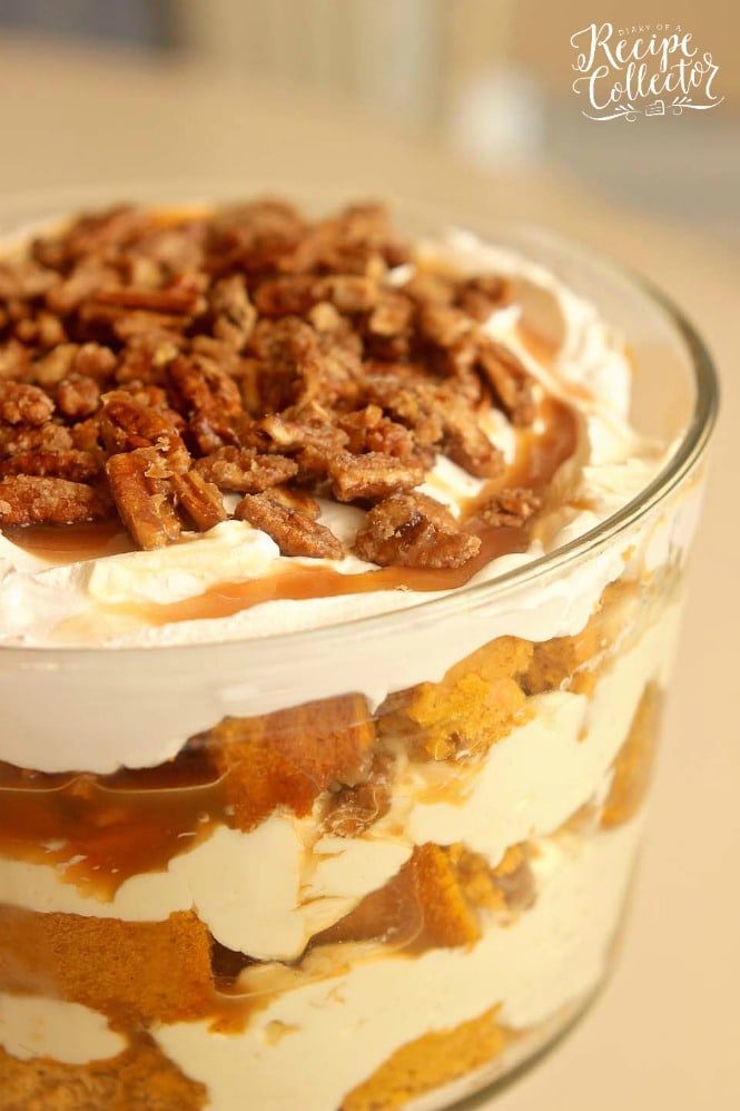 Pumpkin Praline Trifle - This is the ultimate fall dessert recipe with layers of easy pumpkin cake, cream cheese pudding, caramel, and praline pecans.  It's delicious made ahead and great for the busy holiday dinners!