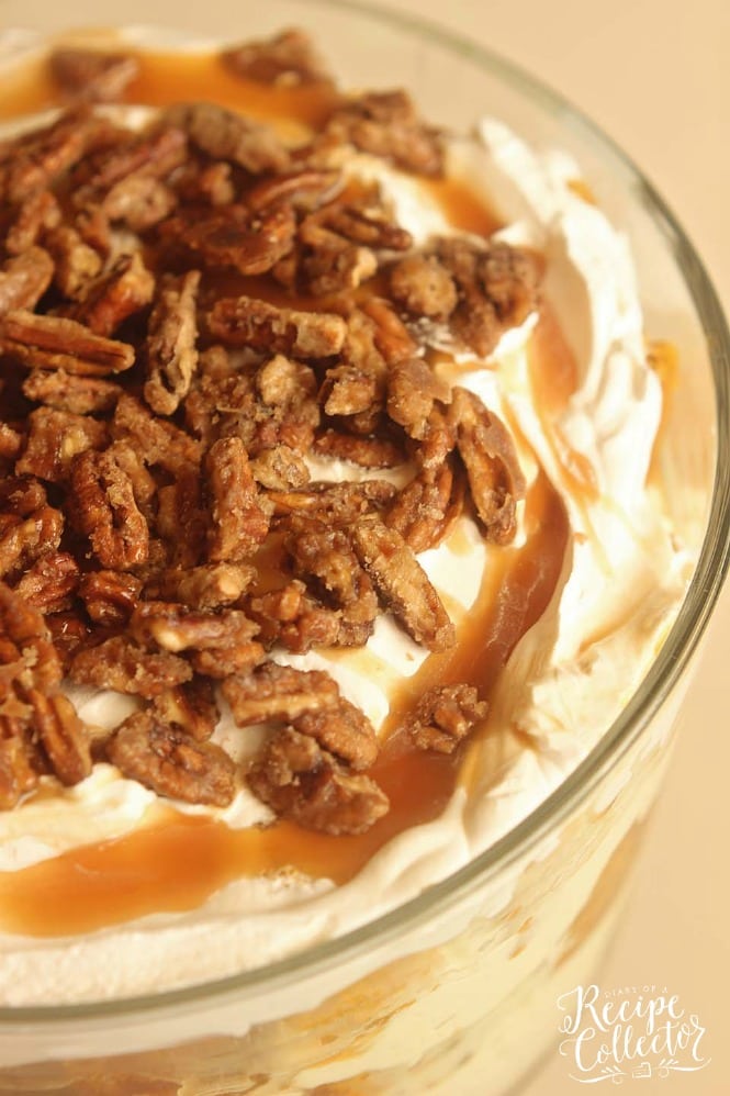 Pumpkin Praline Trifle - This is the ultimate fall dessert recipe with layers of easy pumpkin cake, cream cheese pudding, caramel, and praline pecans.  It's delicious made ahead and great for the busy holiday dinners!