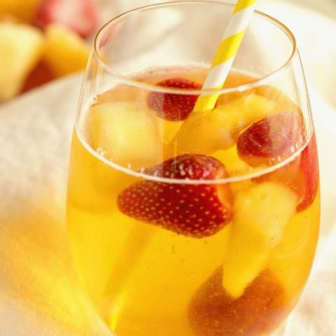 Easy Summer Sangria - A super easy sangria recipe perfect for the beach or the pool!  Plus, it can be made with white or red wine!!